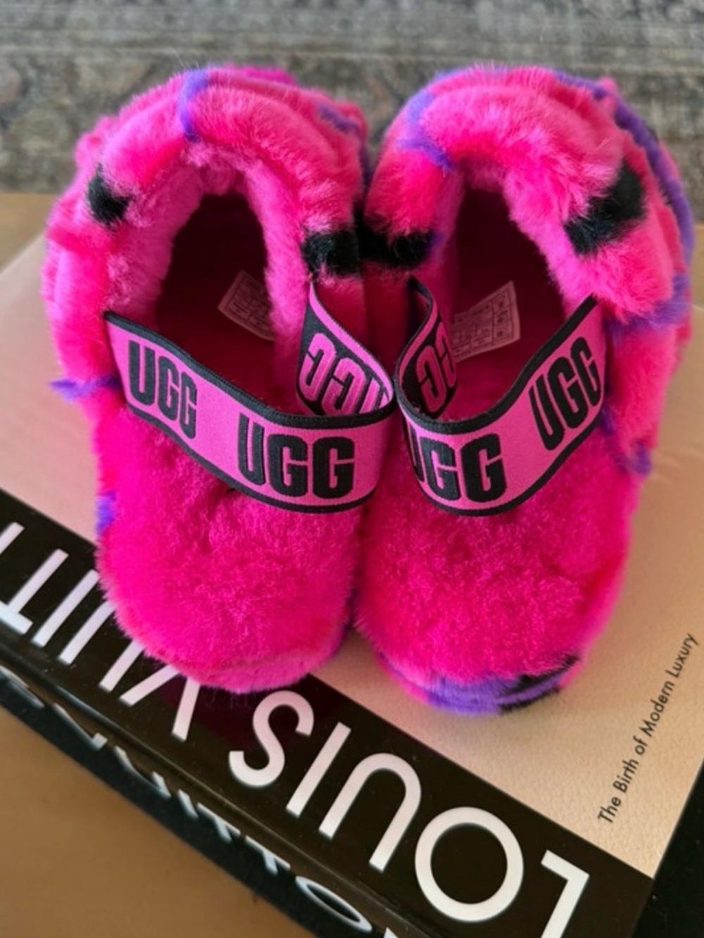 UGG woman’s size 7 Bright Pink Fuzzy Slip-Ons with Logo Strap